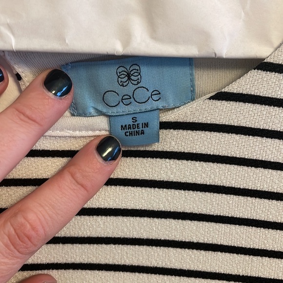 Black and white striped short sleeved dress with black lace on the bottom - Picture 3 of 6